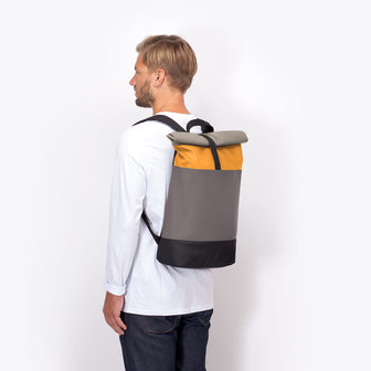Ucon Acrobatics Lotus Hajo Backpack Mustard/Grey model man