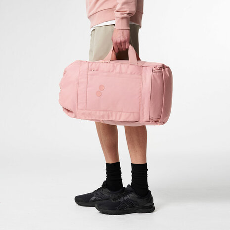 Pinqponq Blok Medium Backpack Ash Pink model man hand